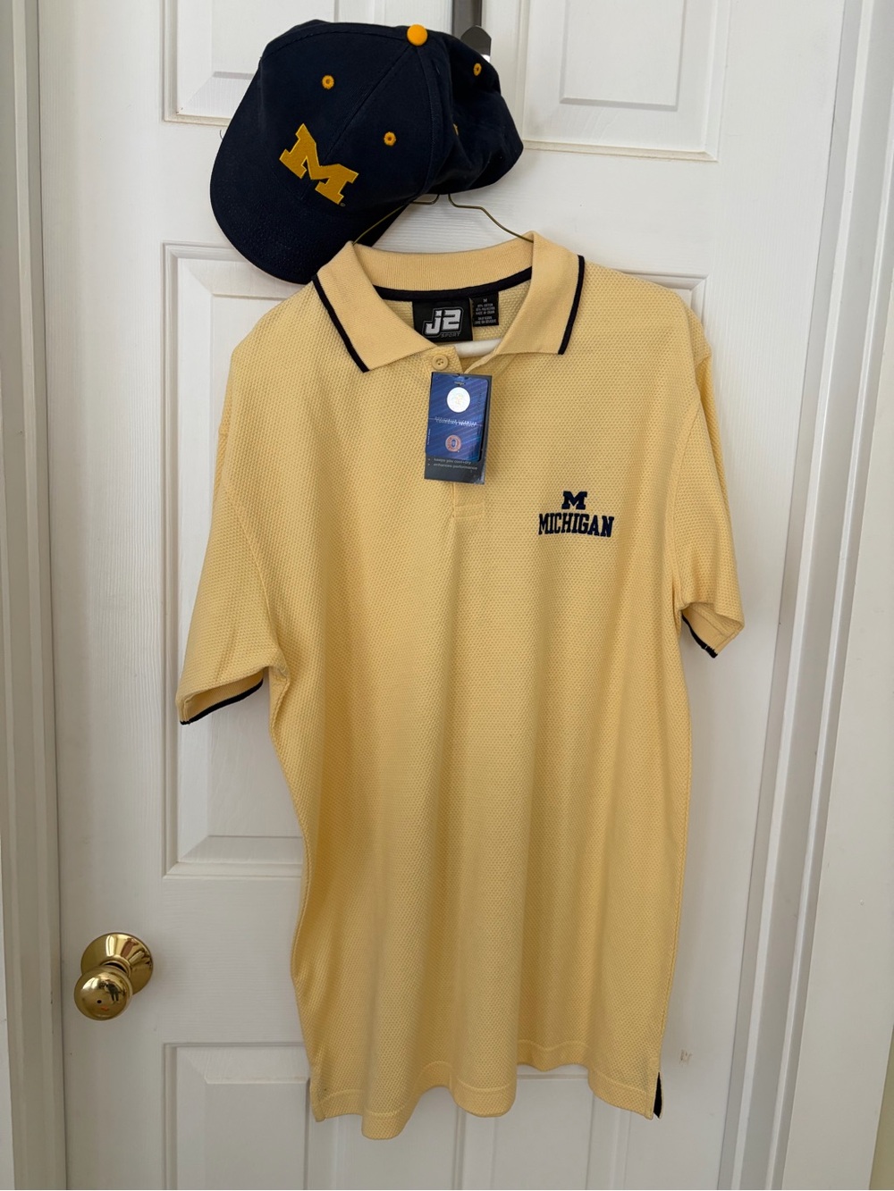 Michigan Embroidered Gold Polo Shirt snd Michigan Hat.  -